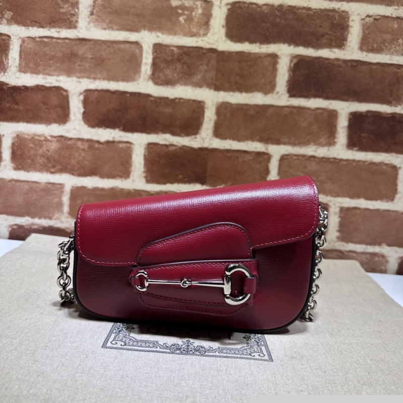 G*u*i top handle bags